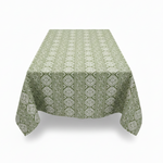 Green patterned tablecloth on a white background