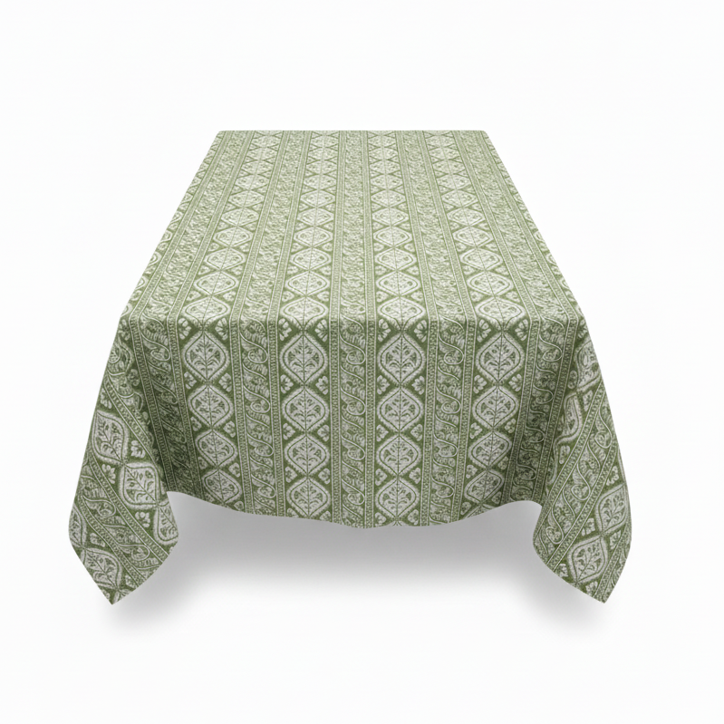Green patterned tablecloth on a white background