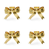 SET OF 4 BOW NAPKIN RINGS, BRASS